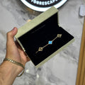 AZUL TURQUESA CON DORADO PULSO VC